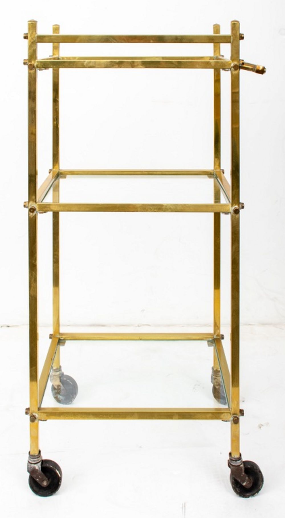 Appraisal: MID CENTURY MODERN BRASS GLASS BAR CART Mid-Century Modern diminutive