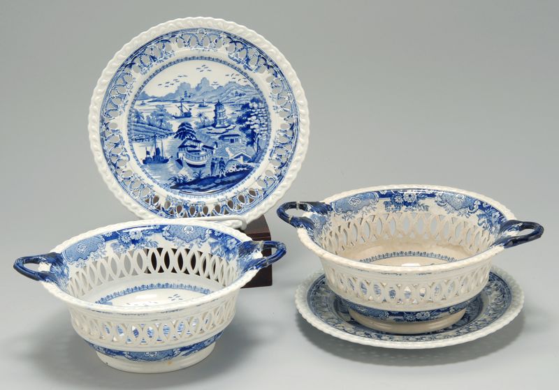 Appraisal: PAIR OF STAFFORDSHIRE FENESTRATED HANDLED BOWLS WITH UNDERTRAYS th CenturyIn