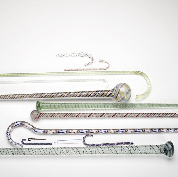 Appraisal: GLASS CANES AND BATONS Grouping of fourteen in assorted sizes