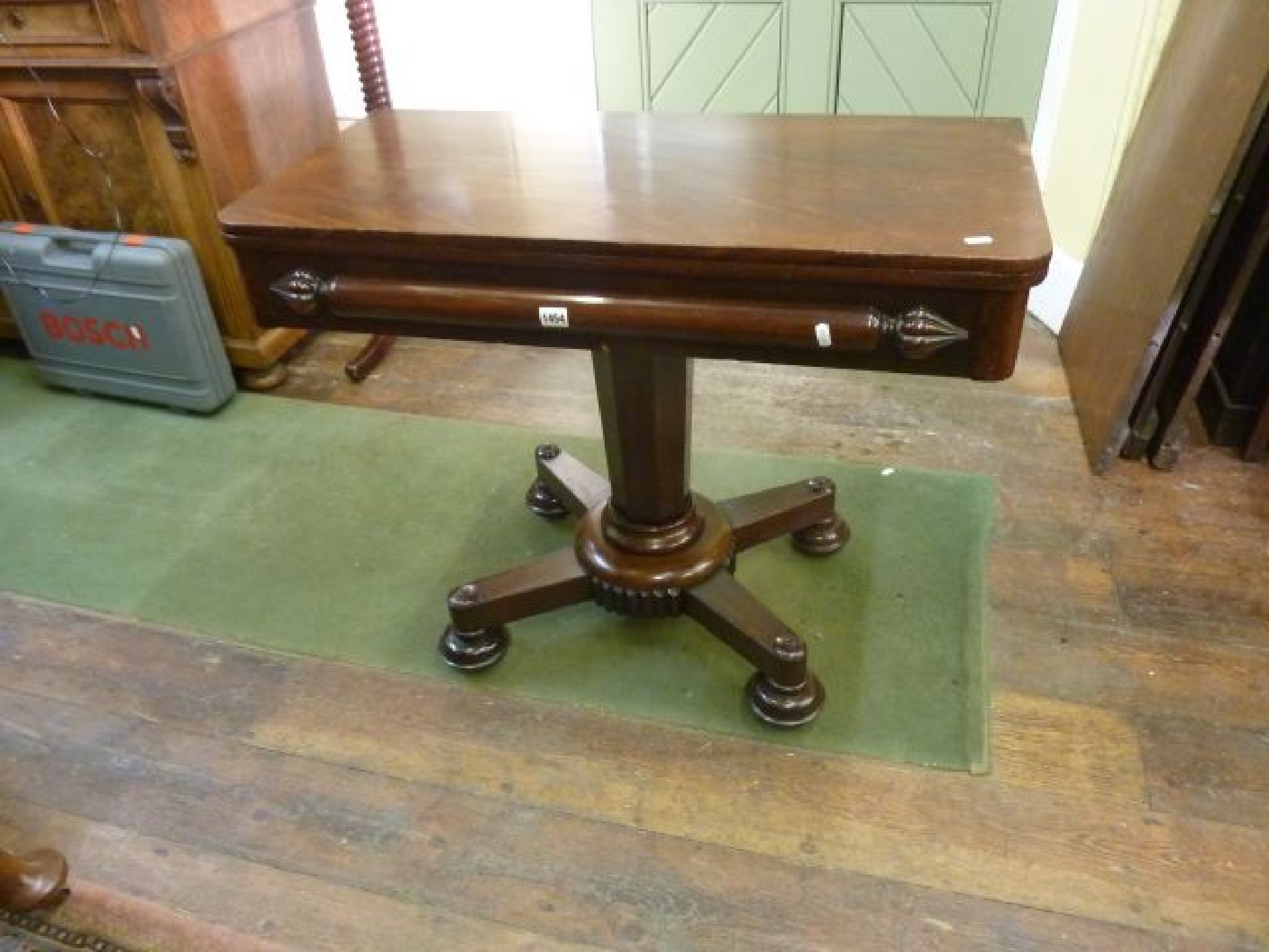 Appraisal: A late Regency mahogany fold over top tea table of