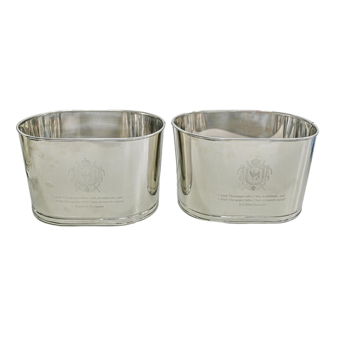 Appraisal: A pair of polished metal champagne buckets cm h More