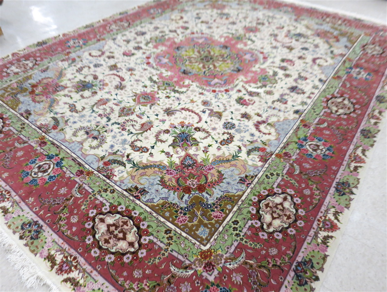 Appraisal: A CONTEMPORARY PERSIAN WOOL AND SILK CARPET floral and central