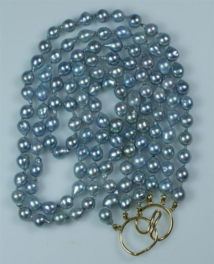 Appraisal: triple strand necklace of about - mm gray Tahitian baroque