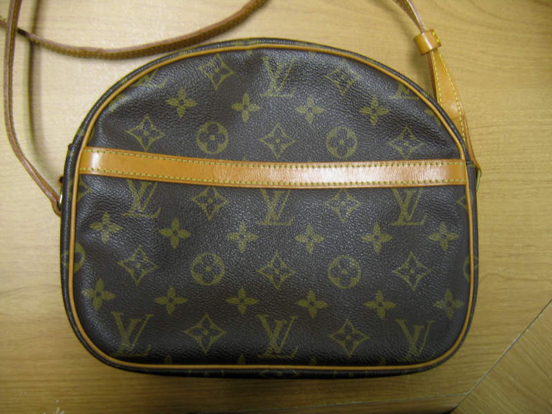 Appraisal: LOUIS VIUTTON HANDBAG Zippered shoulder Monogram bag with additional zippered