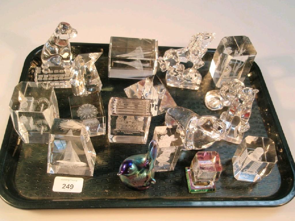 Appraisal: A collection of clear crystal paperweights including a seated dog