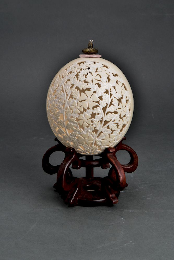 Appraisal: Ostrich Egg Carved with Floral Foliate Motifs Ostrich egg with