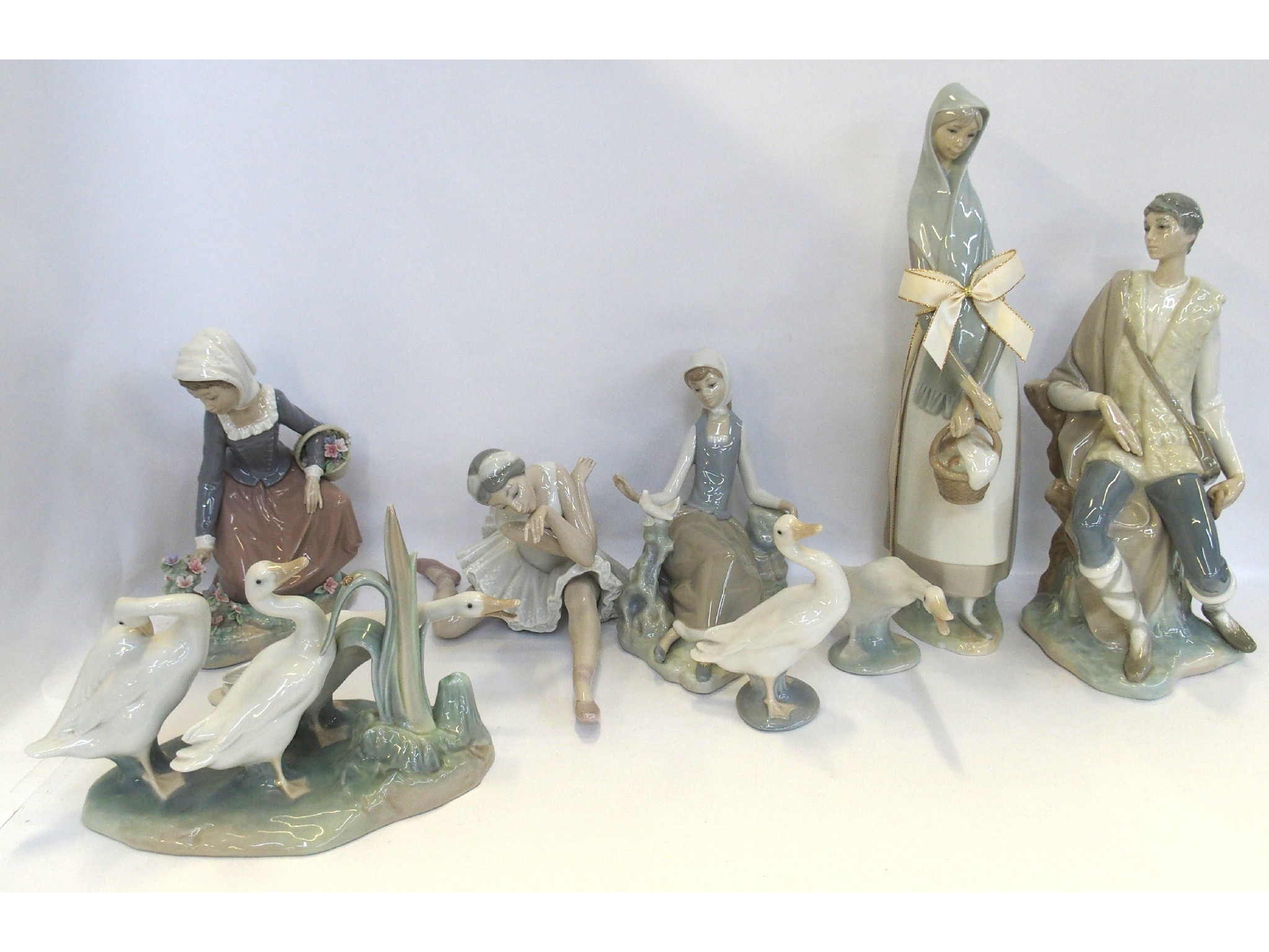 Appraisal: Eight Lladro figures including a shepherd ballerina three girls and