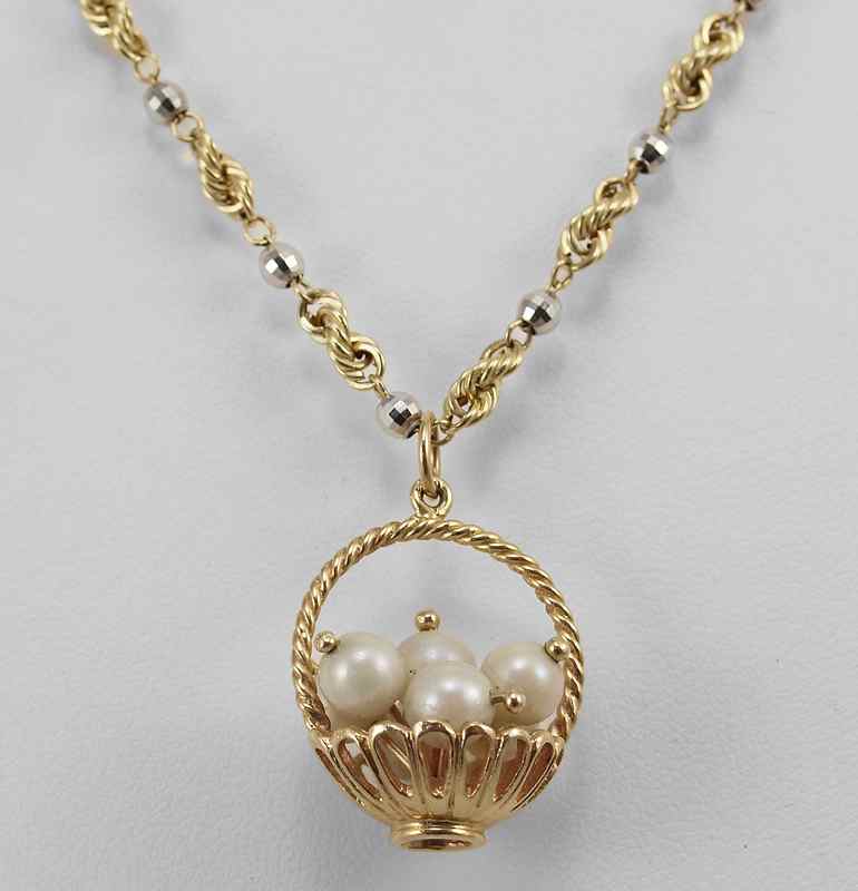 Appraisal: K PEARL BASKET NECKLACE K yellow gold basket filled with