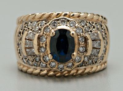 Appraisal: Diamond and sapphire ring center oval faceted blue sapphire estimated