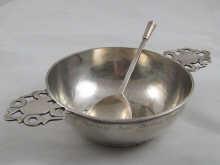 Appraisal: A silver porringer hallmarked London cm diameter together with a