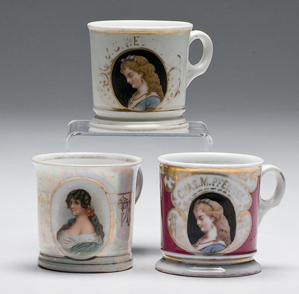 Appraisal: LOT OF THREE WOMEN'S PORTRAIT SHAVING MUGS st mug porcelain