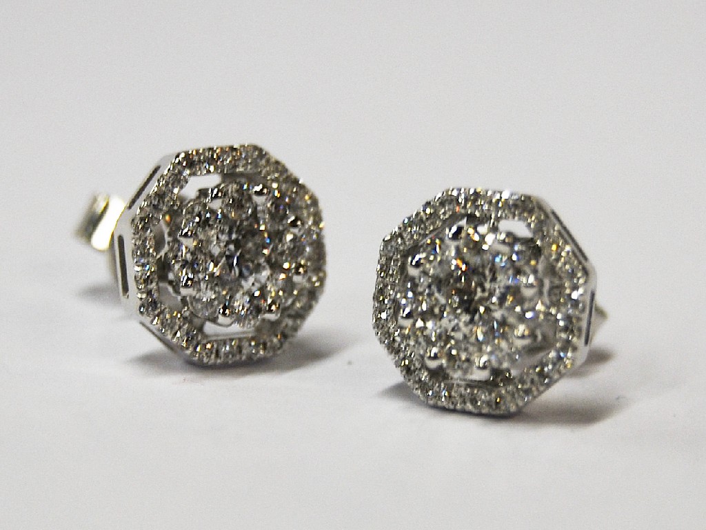 Appraisal: Pair of diamond cluster earrings the central brilliant cut diamond