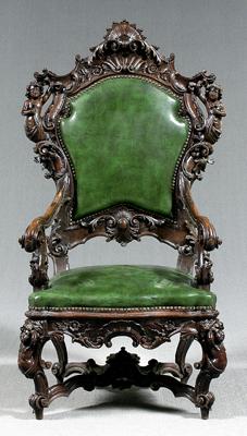 Appraisal: Italian rococo style carved armchair massive scale with carved figures