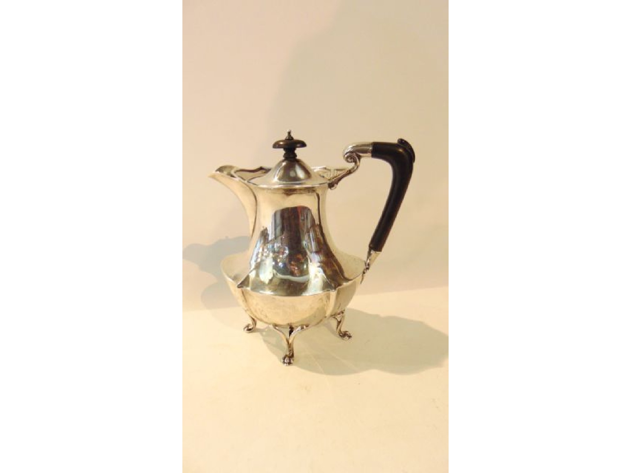 Appraisal: A George V silver coffee pot Walker Hall Sheffield the