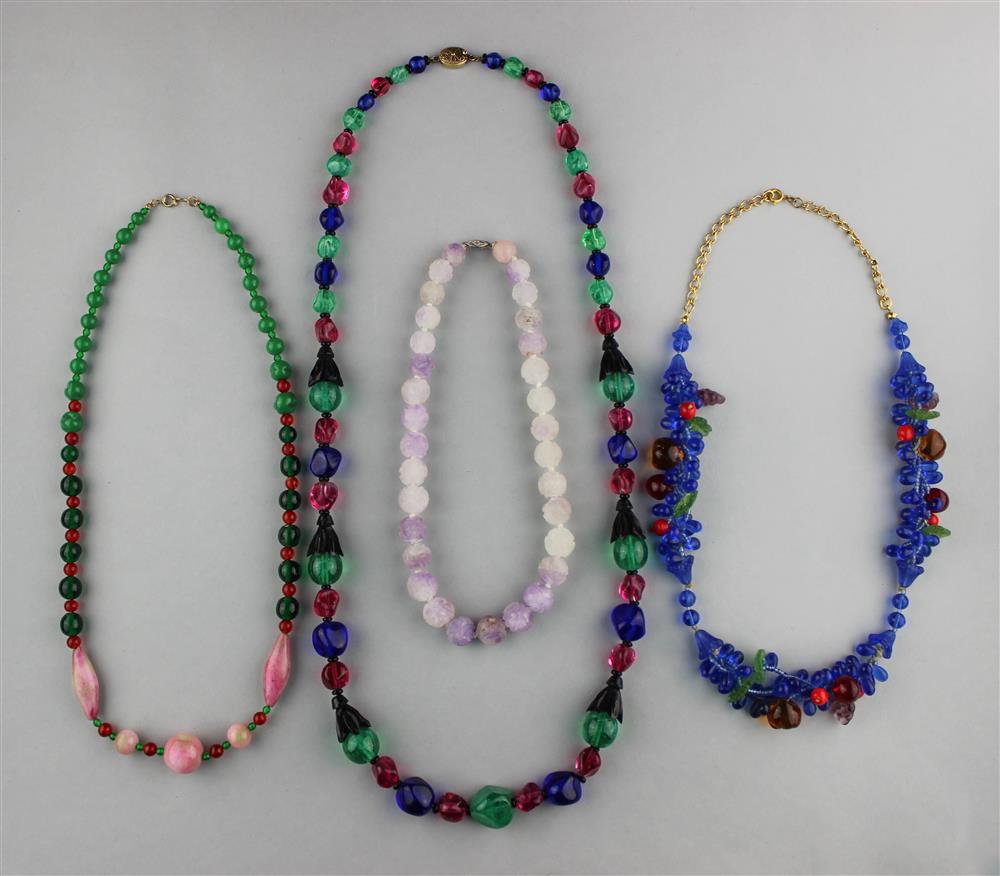 Appraisal: THREE ITALIAN GLASS NECKLACES AND A CARVED BEADED NECKLACE