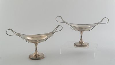 Appraisal: A pair of Edwardian boat-shaped bon bon tazzae with bobbin