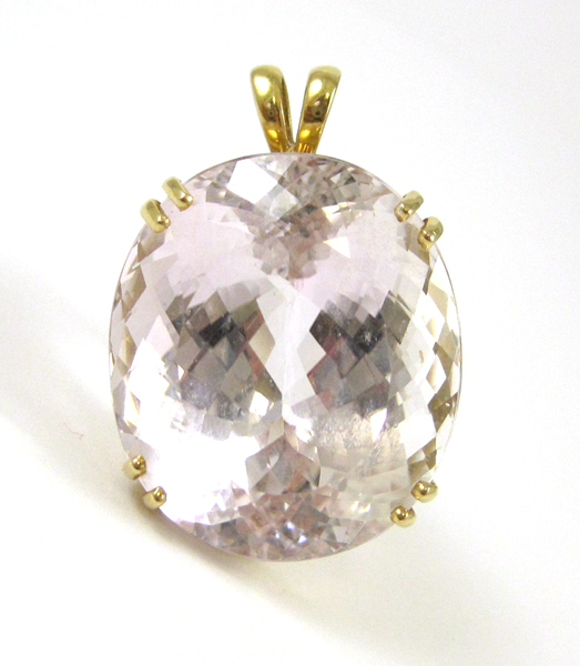 Appraisal: KUNZITE AND FOURTEEN KARAT GOLD PENDANT featuring a large oval