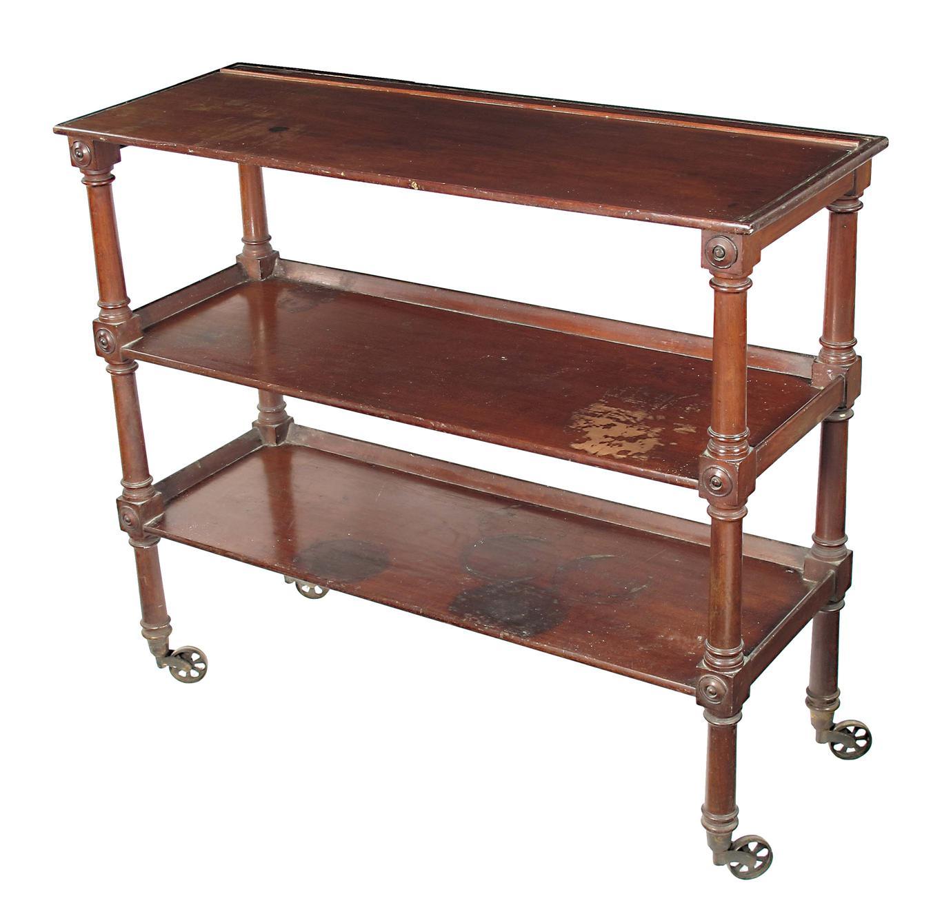 Appraisal: A Victorian mahogany three tier buffet