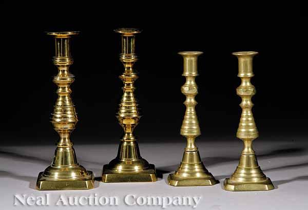 Appraisal: Two Pairs of English Brass Candlesticks beehive-form standards chamfered square