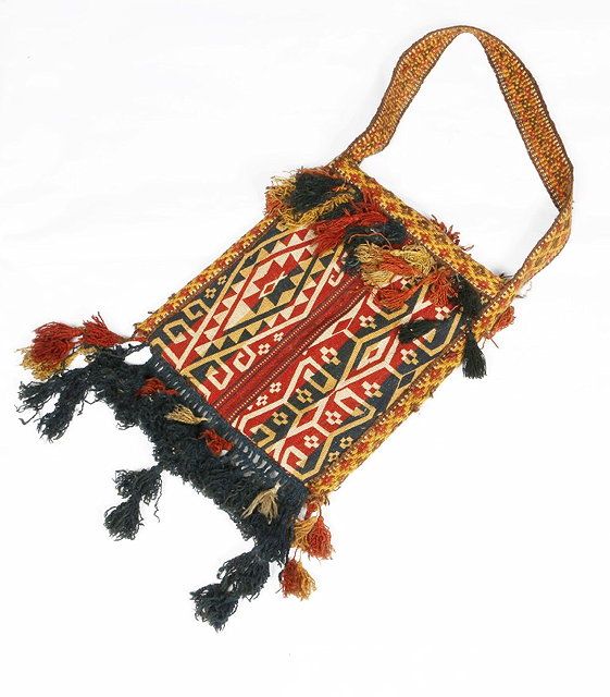 Appraisal: AN AFGHAN SHOULDER BAG with red yellow and black geometric