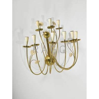 Appraisal: STILNOVO Brass ten-light candle sconce with daisy motif Marked x