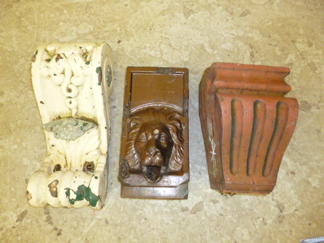 Appraisal: THREE VARIOUS BROWN SALT GLAZED RAIN WATER OUTLET BRICKS each