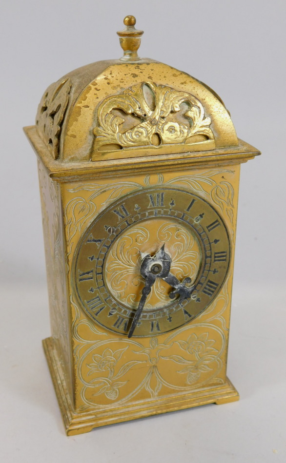 Appraisal: A mid thC gilt brass carriage type clock with engraved