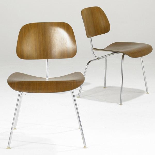 Appraisal: CHARLES RAY EAMES Pair of DCMs in walnut Each with