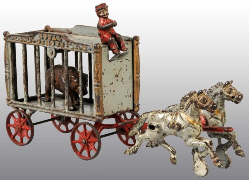 Appraisal: Cast Iron Hubley -Horse Royal Circus Cage Wagon Description Includes