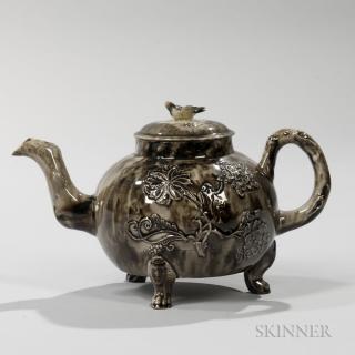 Appraisal: Staffordshire Translucent Brown Glazed Cream-colored Earthenware Teapot and Cover England