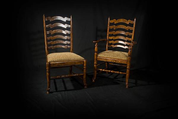 Appraisal: A set of eight George III style elm ladder back