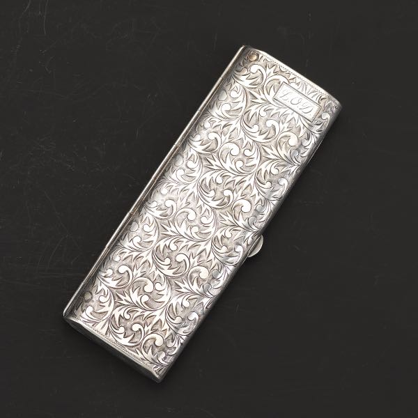 Appraisal: STERLING SILVER ART DECO CIGARETTE CASE x x Elongated hinged