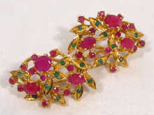 Appraisal: A pair of ruby and high carat gold earrings weight