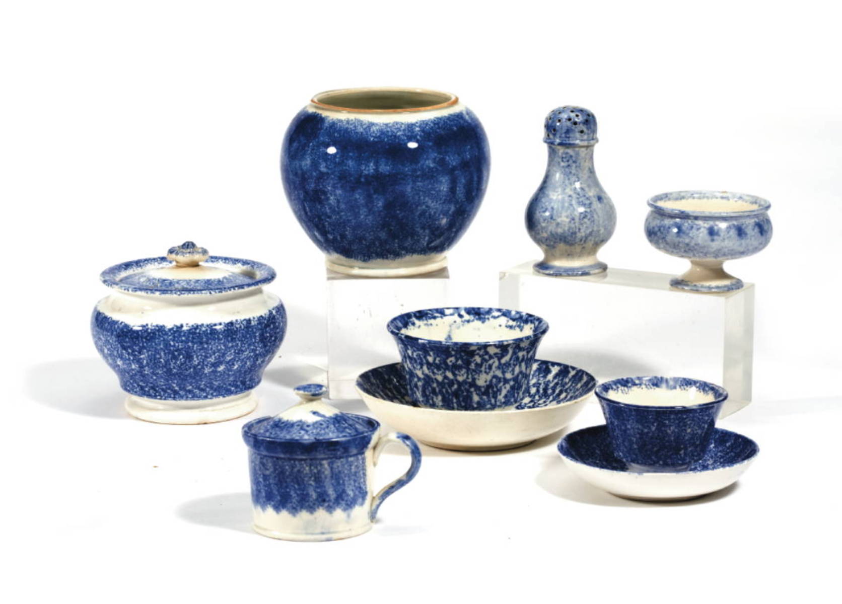 Appraisal: GROUP OF STAFFORDSHIRE BLUE SPATTERWARE WARES CIRCA Comprising two teabowls