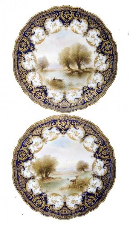 Appraisal: A PAIR OF ROYAL WORCESTER COBALT GROUND PLATES painted by