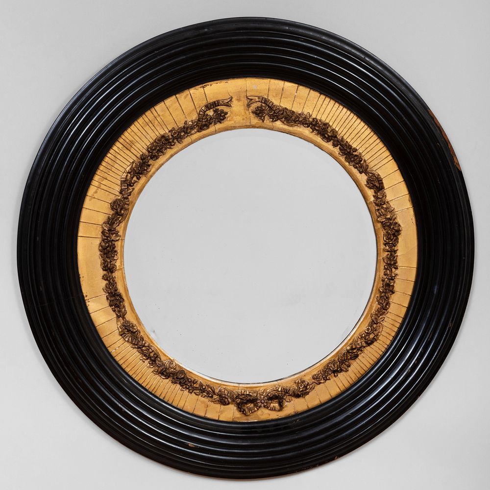 Appraisal: Modern Ebonized and Parcel-Gilt Circular Mirror in diam Condition Minor