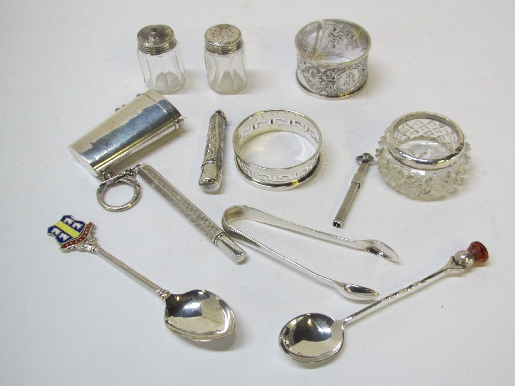 Appraisal: Lot comprising silver napkin rings spoons letter opener etui etc