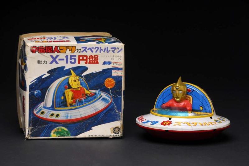 Appraisal: Specter Man Flying Saucer Toy Description Japanese Made by Masudaya