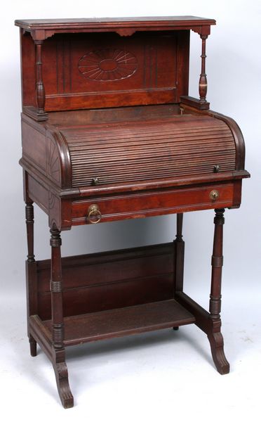 Appraisal: Late Victorian cherry roll-top desk h x l x d