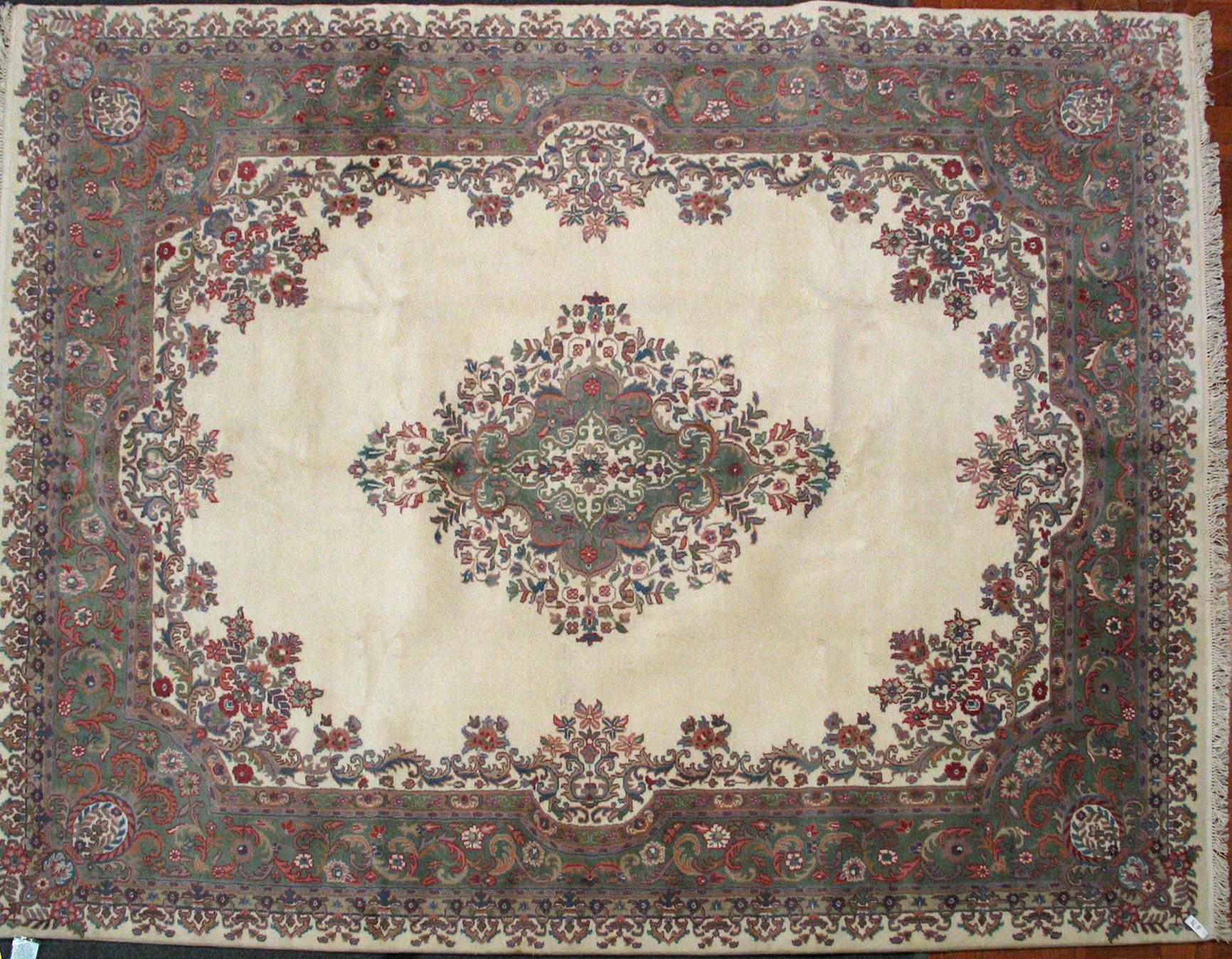 Appraisal: An Indian carpet size approximately ft x ft