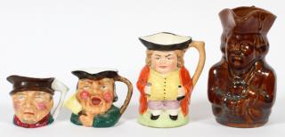 Appraisal: ENGLISH AND AMERICAN POTTERY TOBY MUGS FOUR ENGLISH AND AMERICAN