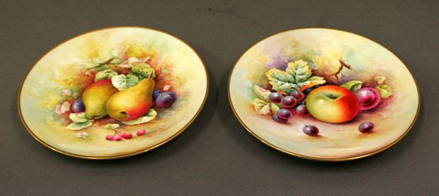 Appraisal: A pair of Minton cabinet plates painted with fruit by