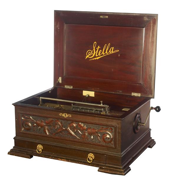 Appraisal: STELLA Mahogany cased music box complete with twenty discs x