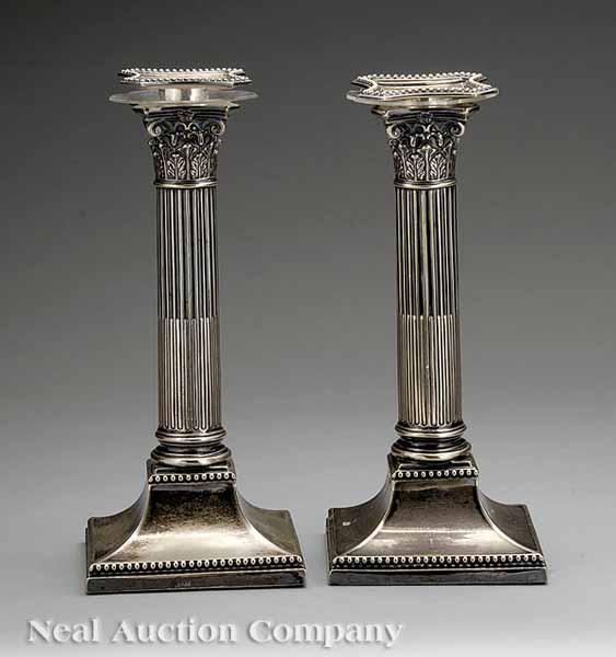 Appraisal: A Pair of Mappin Webb Silverplate Table Candlesticks early th