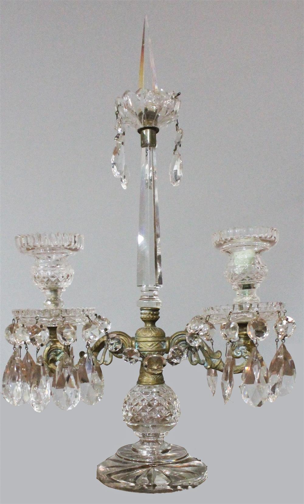 Appraisal: CRYSTAL DOUBLE LIGHT CANDELABRA with a crystal spike between candle