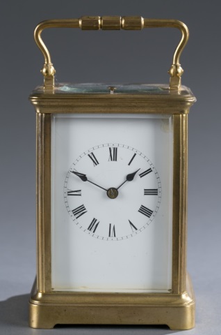 Appraisal: Brass Carriage Clock Roman numeral face with beveled glass case