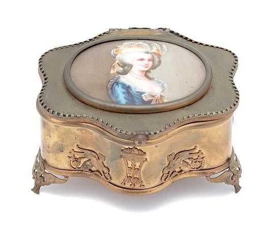 Appraisal: A French Gilt Metal Cartouche-form Jewel Box Height x width