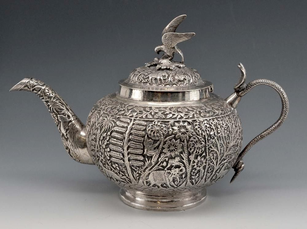 Appraisal: Asian silver teapot with bird knop serpent handle Asian silver