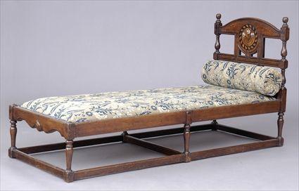 Appraisal: ENGLISH PART-EBONIZED AND MOTHER-OF-PEARL INLAID OAK DAYBED DESIGNED BY E