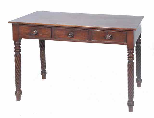 Appraisal: A VICTORIAN MAHOGANY SIDE TABLE with three drawers standing on